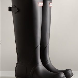 Tall black Hunter rain boots
